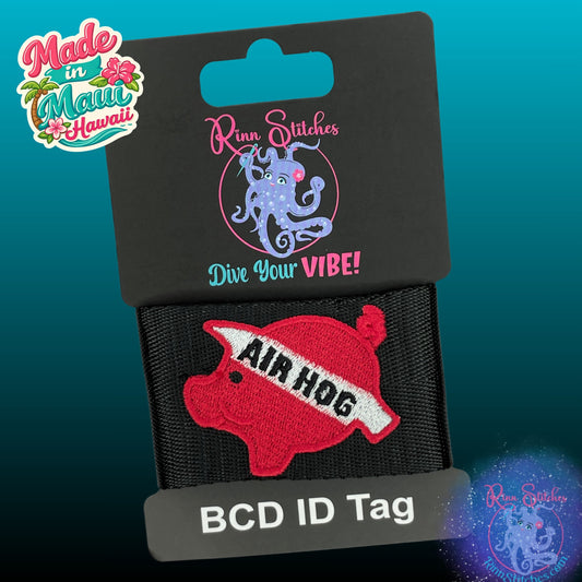 Embroidered BCD Tag with a red and white air hog Design on Black Webbing. Made for scuba divers by Rinn Stitches in Maui, Hawaii