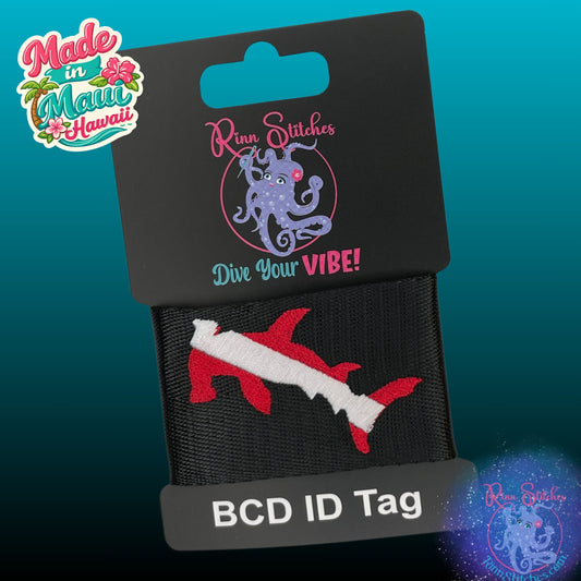 Embroidered BCD Tag featuring a red and white dive flag in the shape of a hammerhead shark. Made by Rinn Stitches in Maui, Hawaii