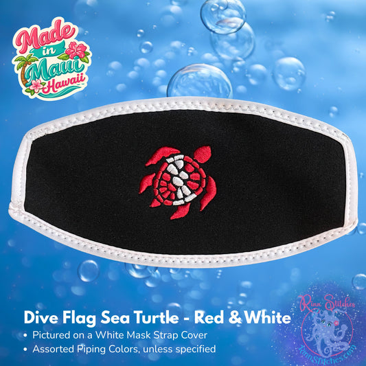 Black neoprene mask strap cover with white piping, featuring a red and white dive flag in the shape of a sea turtle embroidered design. Made by Rinn Stitches in Maui, Hawaii.