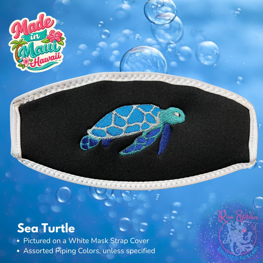 Embroidered neoprene mask strap cover featuring a fun blue and teal sea turtle design. Made in Maui, Hawaii by Rinn Stitches