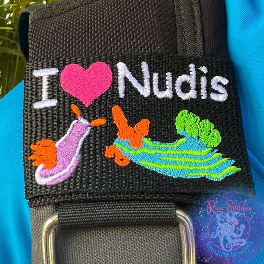Embroidered BCD Tag Featuring a playful ‘I Heart Nudis’ design for true nudibranch lovers on Black Webbing. Made for scuba divers by Rinn Stitches in Maui, Hawaii