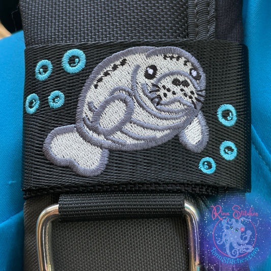 Embroidered BCD Tag featuring a Manatee and fun bubbles design, made by Rinn Stitches on Maui, Hawaii
