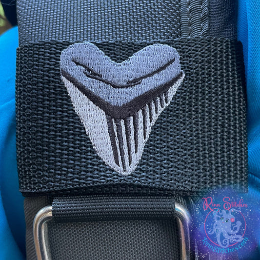 Embroidered BCD Tag with a Megalodon Shark Tooth Design on Black Webbing. Made for scuba divers by Rinn Stitches in Maui, Hawaii