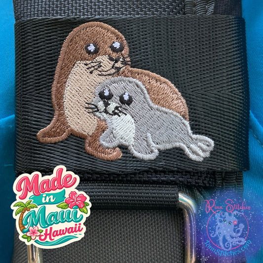 Embroidered BCD Tag featuring a Hawaiian monk seal mamma and pup made by Rinn Stitches on Maui, Hawaii