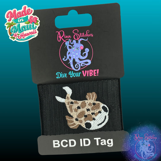 Embroidered BCD Tag Featuring a playful full-body pufferfish design that brings a fun, lively vibe on Black Webbing. Made for scuba divers by Rinn Stitches in Maui, Hawaii