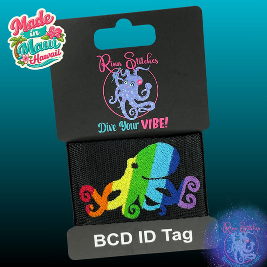 Embroidered BCD Tag Featuring a fun rainbow octopus design that celebrates Pride and self-expression. on Black Webbing. Made for scuba divers by Rinn Stitches in Maui, Hawaii