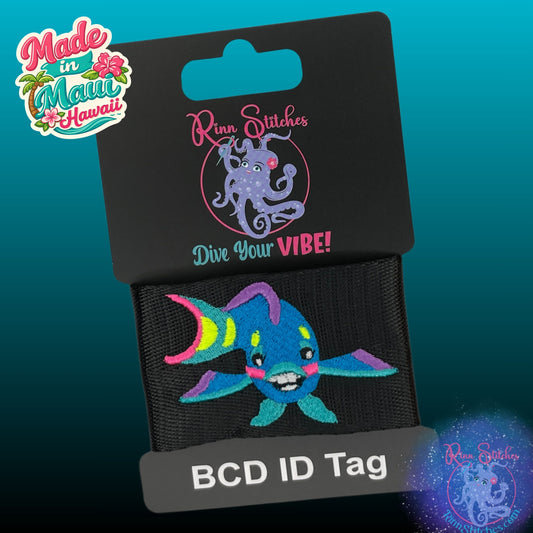 Colorful rainbow parrotfish design embroidered on a black BCD tag. Made by Rinn Stitches in Maui, Hawaii