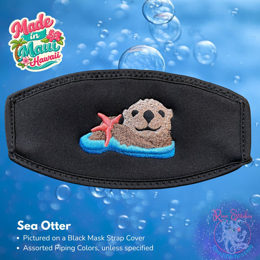 Embroidered mask strap cover featuring a cute sea otter holding a starfish. Made by Rinn Stitches on Maui, Hawaii