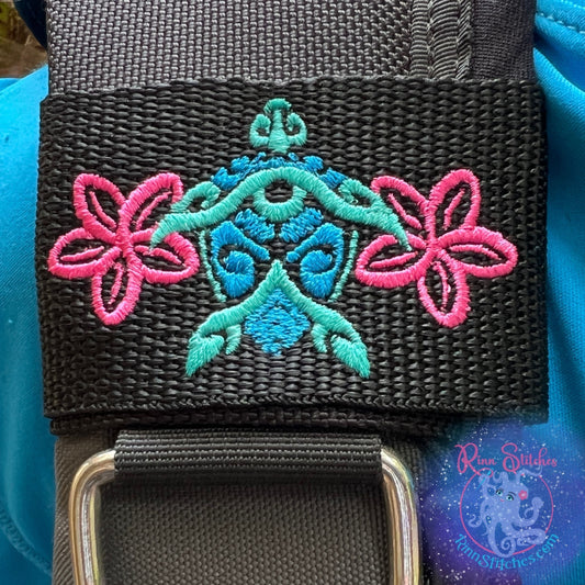 Embroidered BCD Tag Featuring a sea turtle tiki design inspired by island culture and ocean life on Black Webbing. Made for scuba divers by Rinn Stitches in Maui, Hawaii