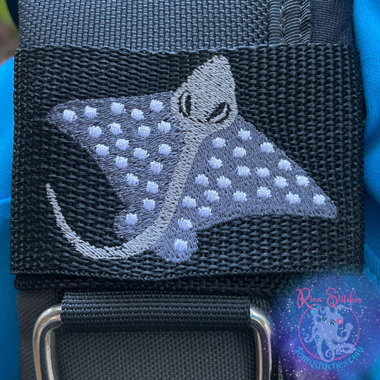 Embroidered BCD Tag with a Spotted Eagle Ray Design on Black Webbing. Made for scuba divers by Rinn Stitches in Maui, Hawaii